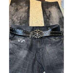 Black men’s studded leather belt with silver Celtic floral ornamental belt buckl